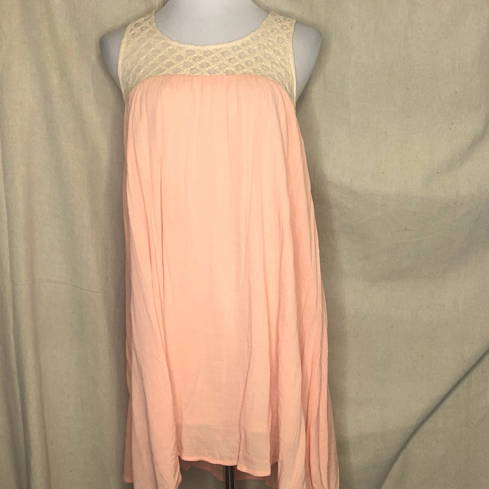 Boutique dress by Andree’ medium blush colored.